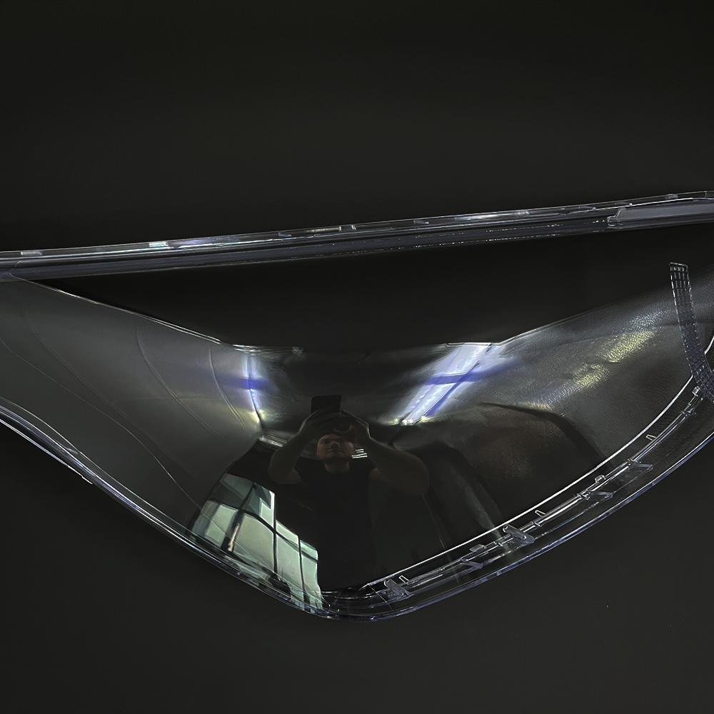 the middle side of headlamp cover